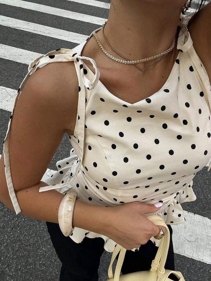 Women Cream Polka Dot Sleeveless Peplum Top with Tie-Up Straps